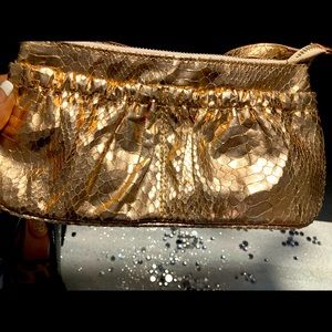 Express metallic gold purse